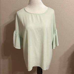 Chic Light Green Blouse with Ruffled Sleeves